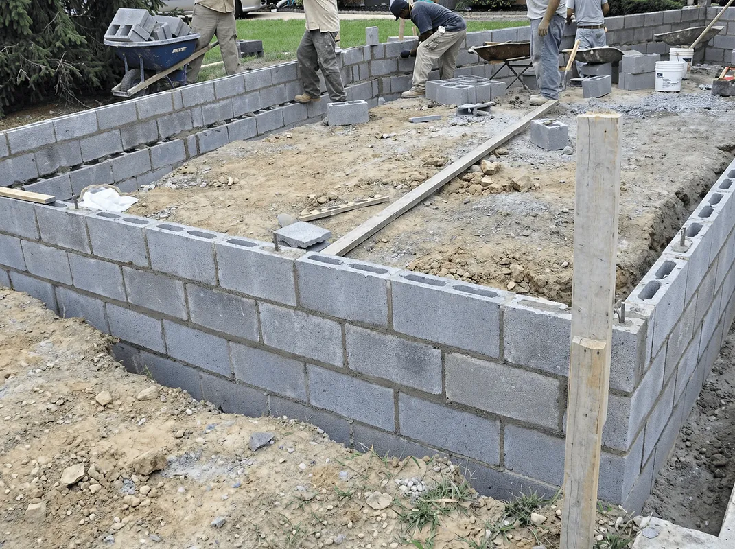 Professionals building a foundation with blocks in San Francisco, CA